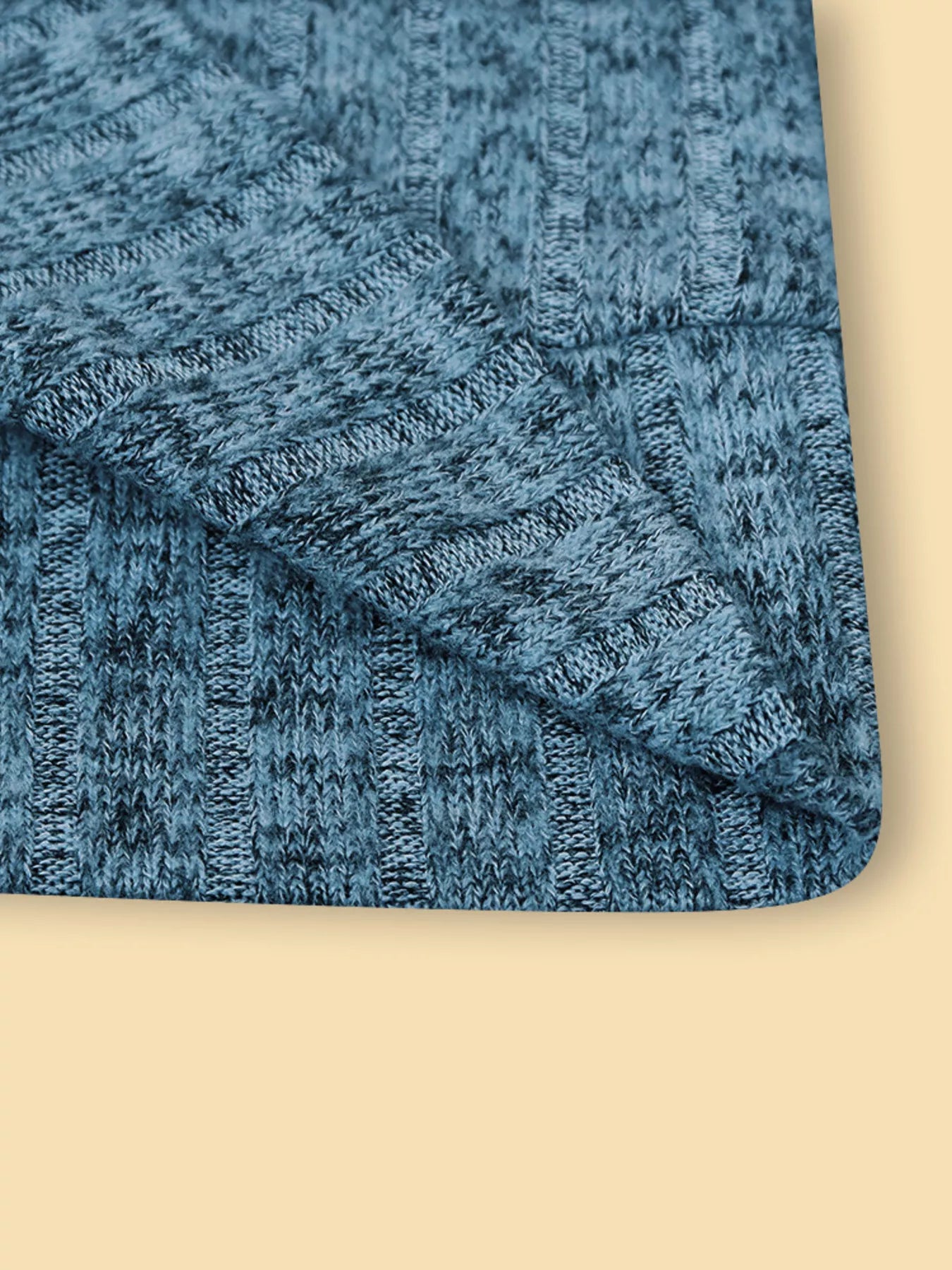 Blue textured fabric on a beige background