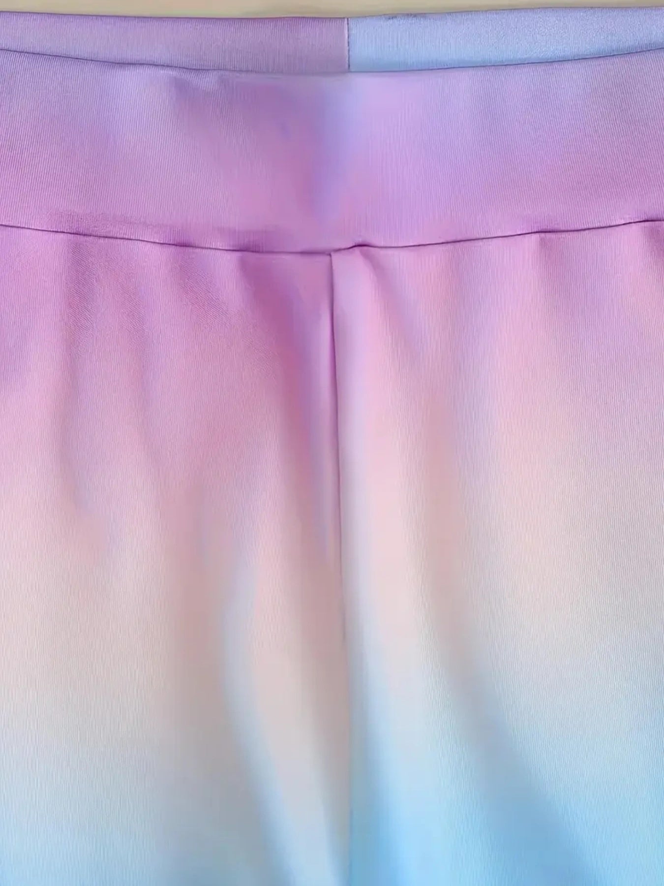 Gradient fabric swatch transitioning from pink to blue