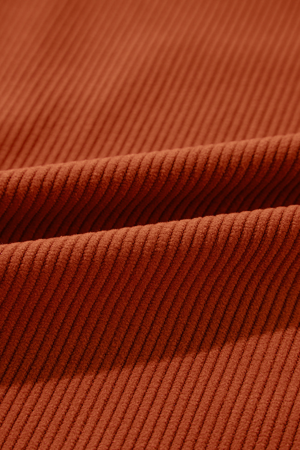 Close-up of brown ribbed fabric texture