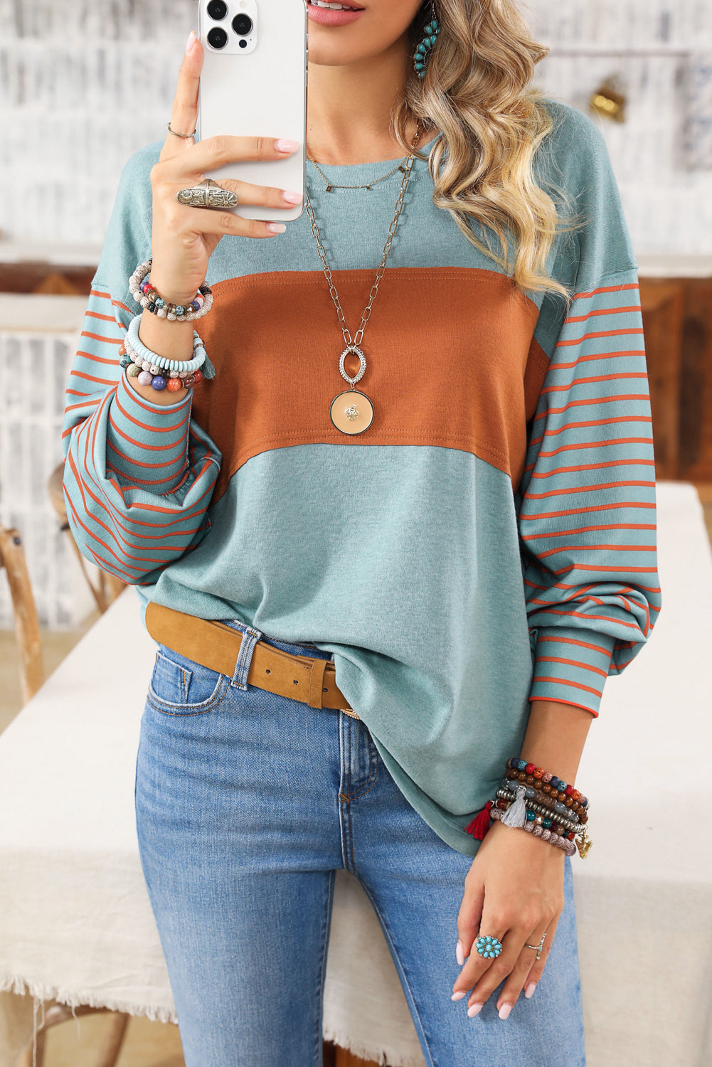 Front view of an Aqua Green Colorblock Striped Blouse