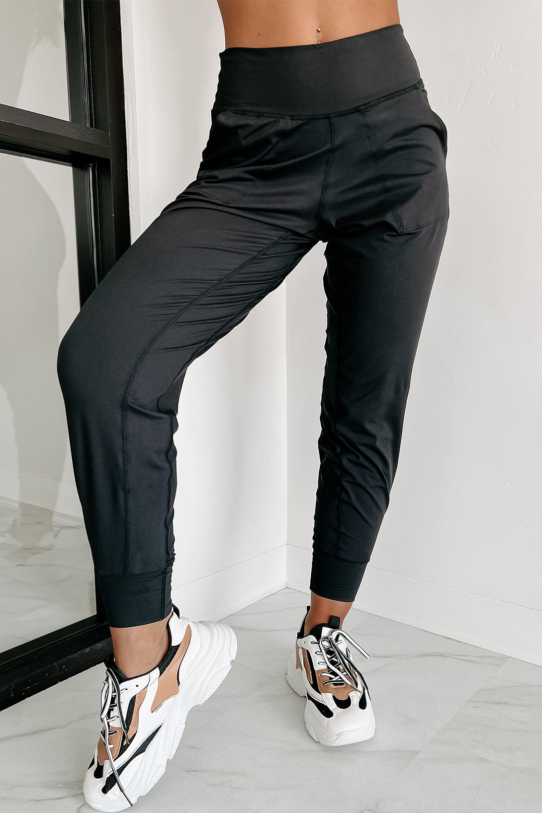 Front view Chic Black Exposed Seam High Waist Pocketed Women’s Joggers