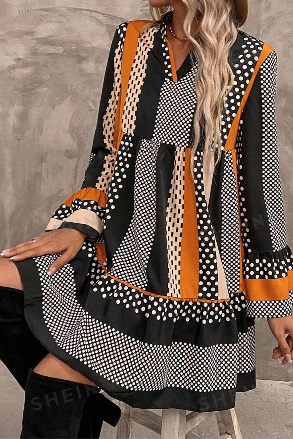 Model wearing an Elegant Black Striped Polka Dot Print Mini Dress