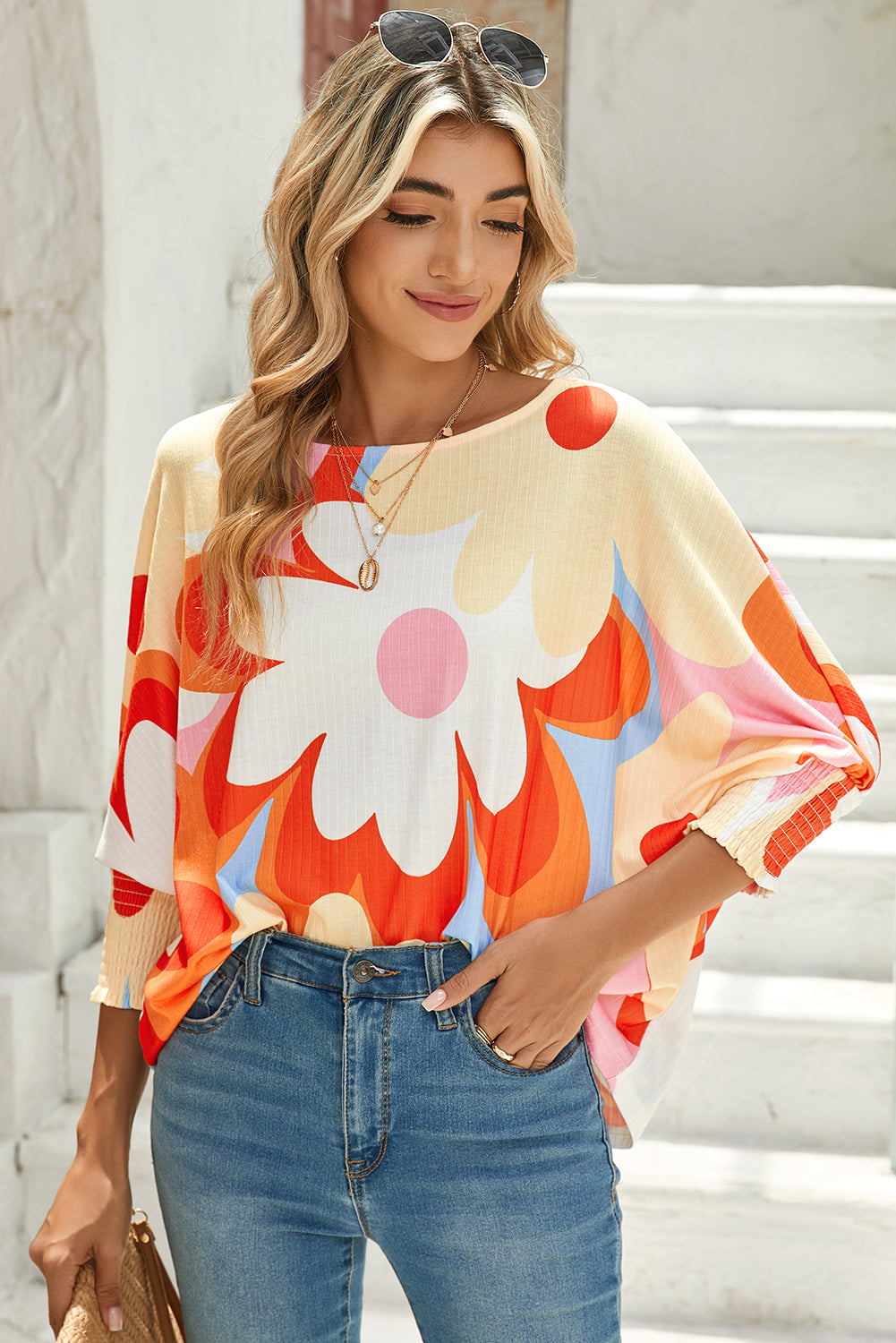 Model wearing a Modern Hippie Woman's Colorful Floral Print Dolman Blouse