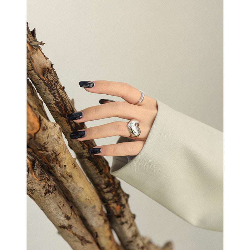 Model wearing silver rhodium plated love me ring