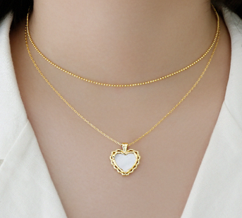 Model wearing Mother of Shell Heart Gold Plated 925 Sterling Silver Necklace