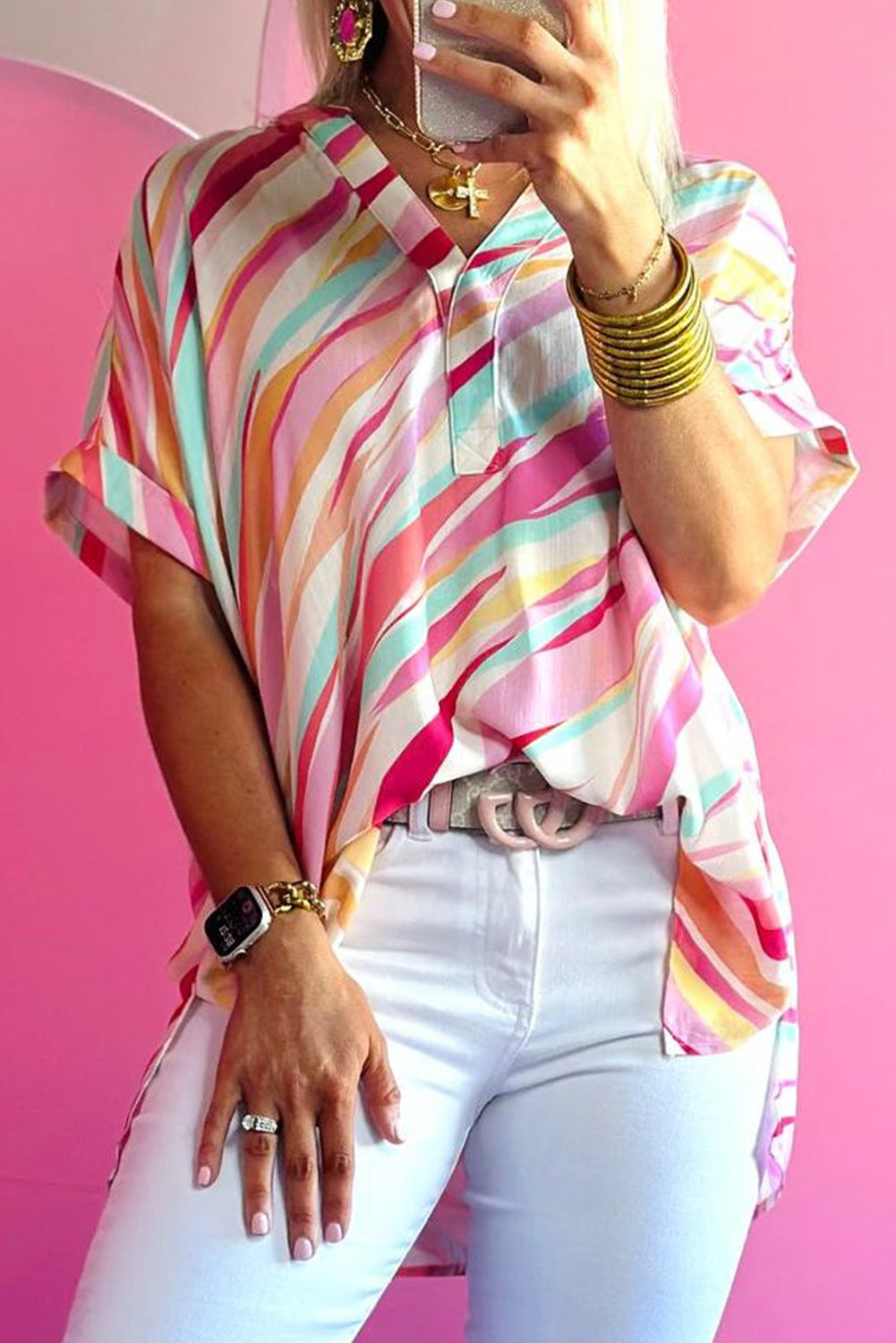 Close up of a model wearing a Fabulous Chic Multicolour Abstract Print High Low Women's Blouse -