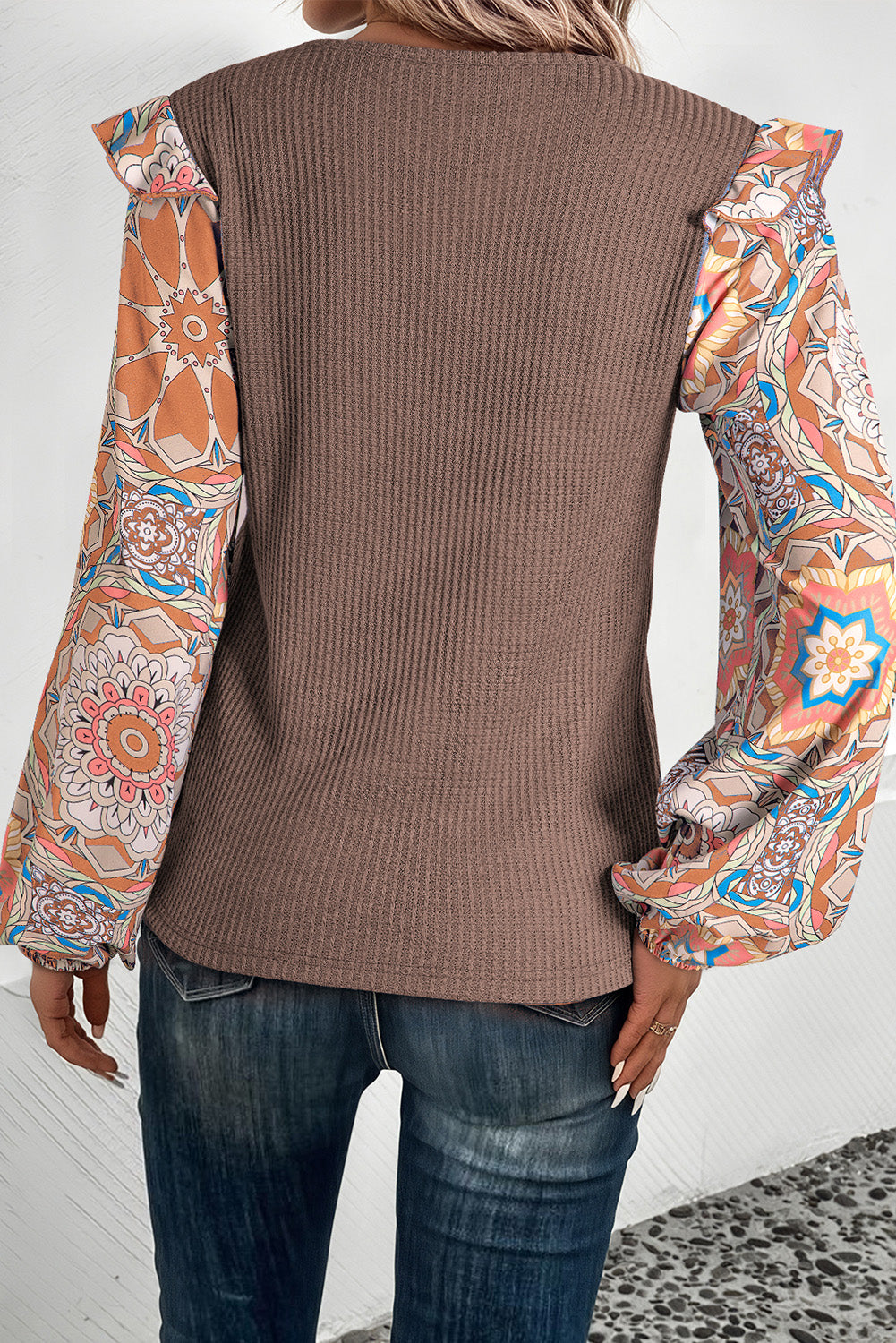 Model wearing a Women's Modern Retro Ruffle Floral Sleeve Coffee Blouse back view