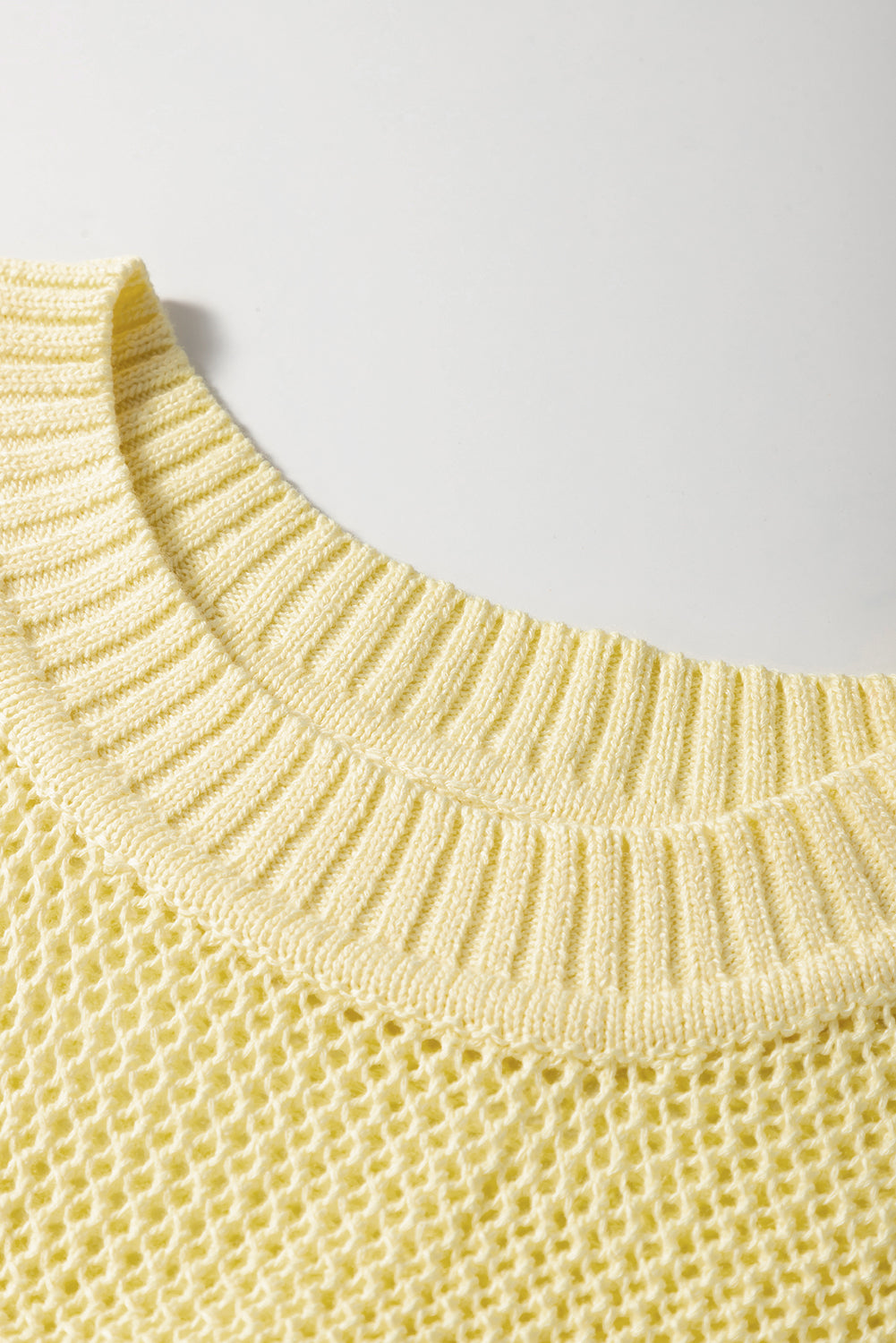 Women's Hollowed Yellow Knit Sweater Vest detailed neckline view