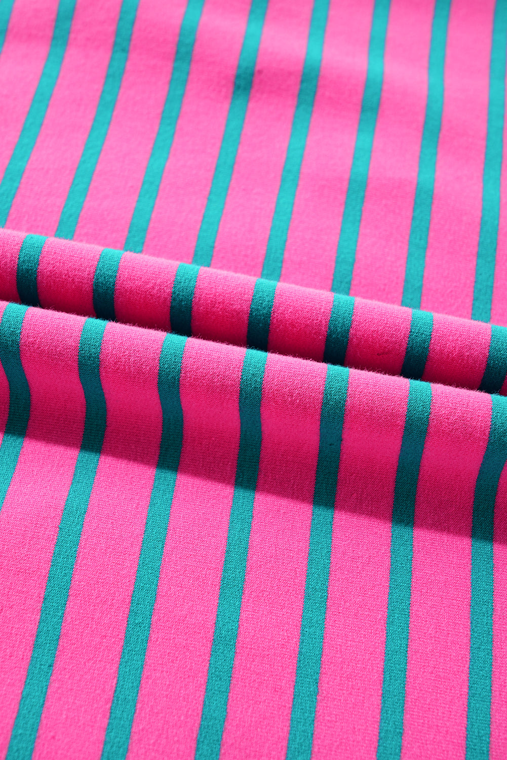Close-up of pink and green striped fabric