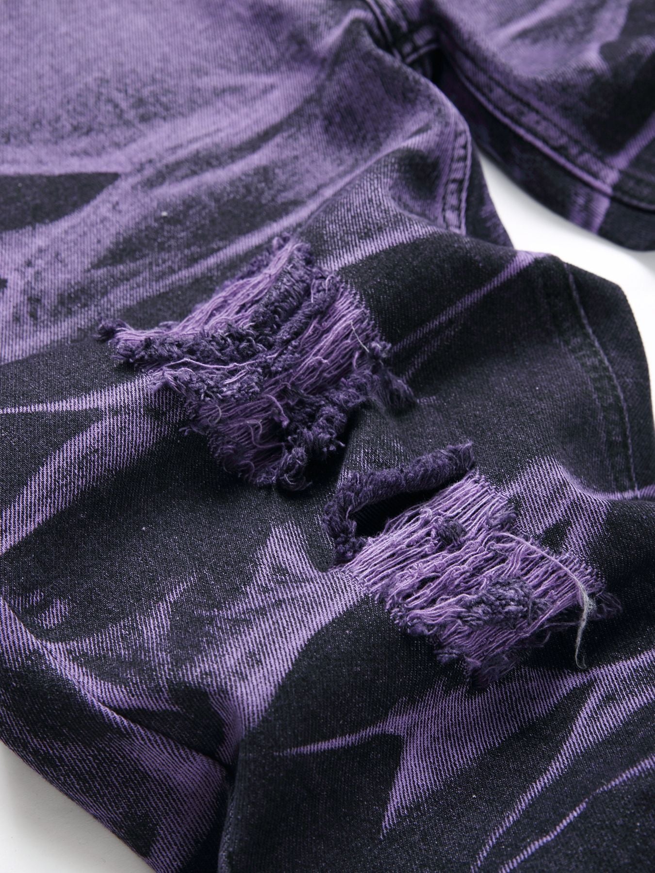 Get street cred with these Purple and Black Urban Men's Denim Trousers. These bold and edgy jeans will make you stand out in the urban fashion scene. With their unique purple and black design and distressed detailing, these high quality jeans are the perfect addition to any streetwear outfit.