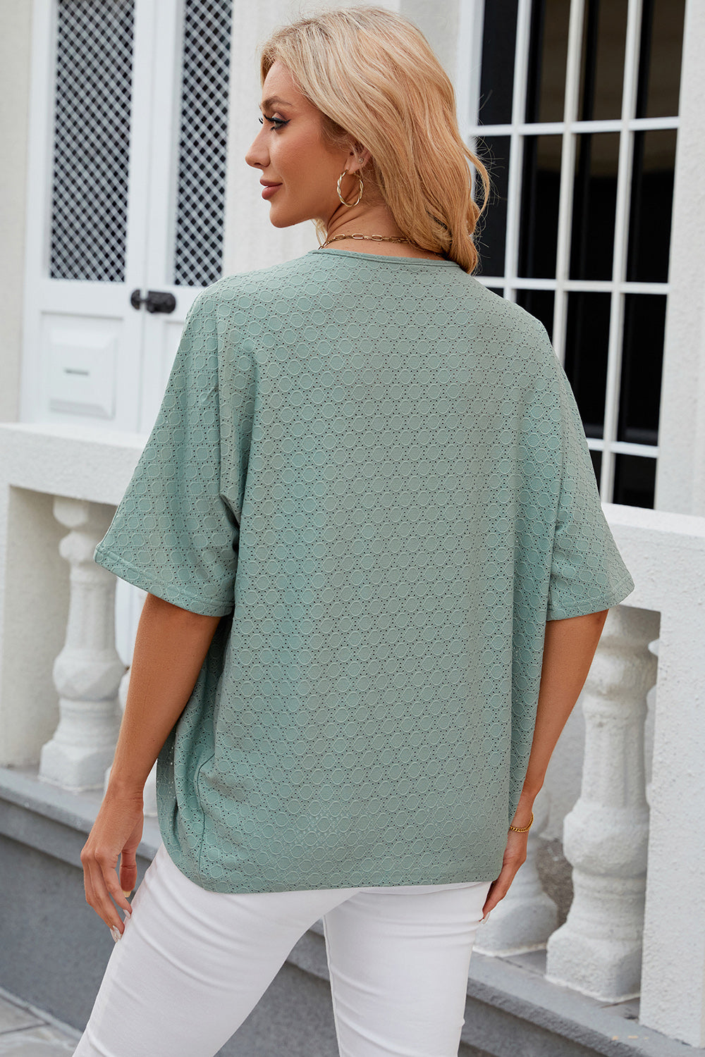 Back view of a model wearing a Light Green Chic Ladies Eyelet Open Front Half Sleeve Cardigan