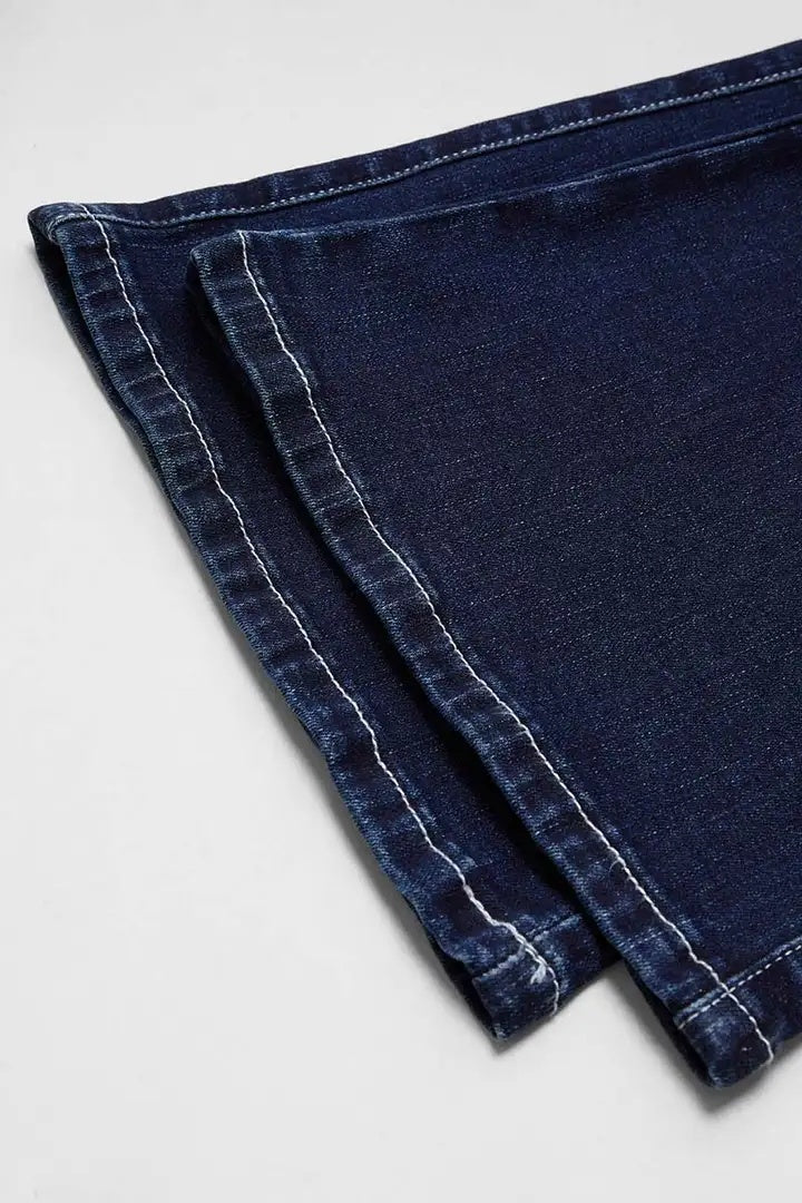 Rebellious Silhouette: High-Waisted Ripped Flare Jeans with Edgy Denim Allure