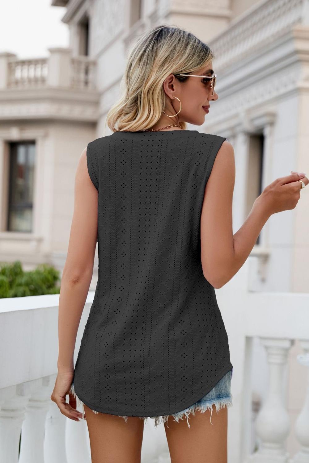 Back view of model wearing black Ladies Sleeveless Eyelet V-Neck Tank