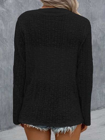 Back view of Model wearing a Black Contemporary Ladies Eyelet Roll-Tab Sleeve Cardigan