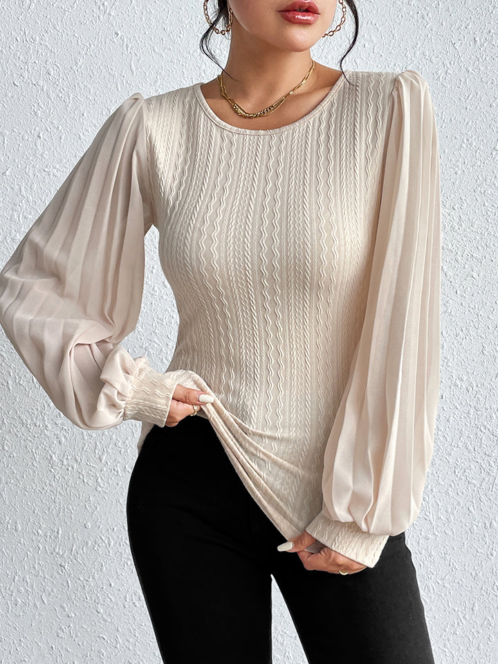 Detail view of a Model wearing a Cream Women's Casual Pleated Puff Sleeve Round Neck Blouse