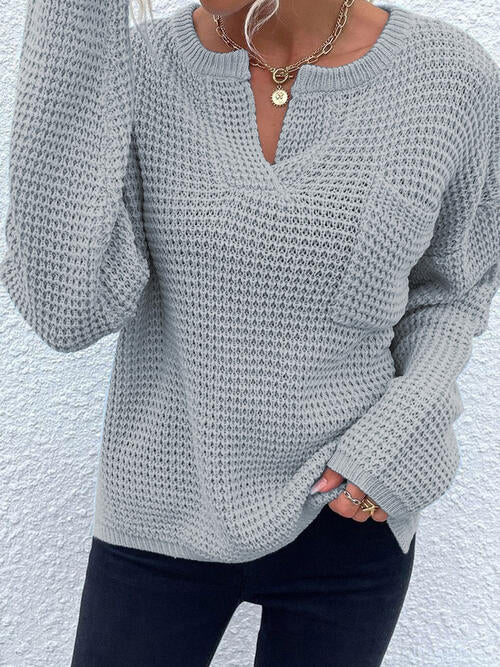 A model wearing a Cloudy Blue Women's Trendy Posh Modern Notched Neckline Sweater