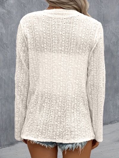Back view of Model wearing a White Contemporary Ladies Eyelet Roll-Tab Sleeve Cardigan