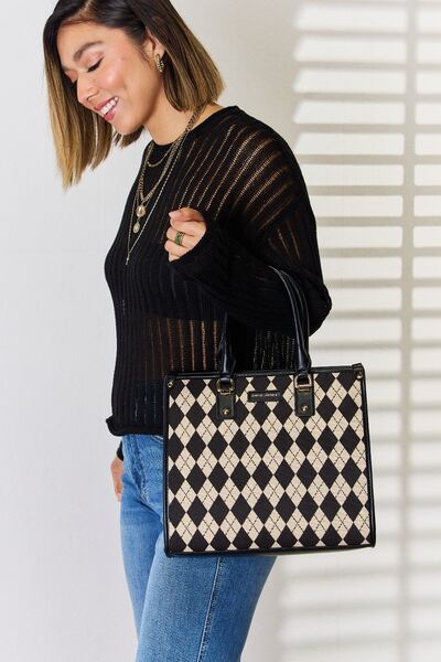 Model holding a Black David Jones Ladies Argyle Pattern PU Leather Handbag off shoulder.