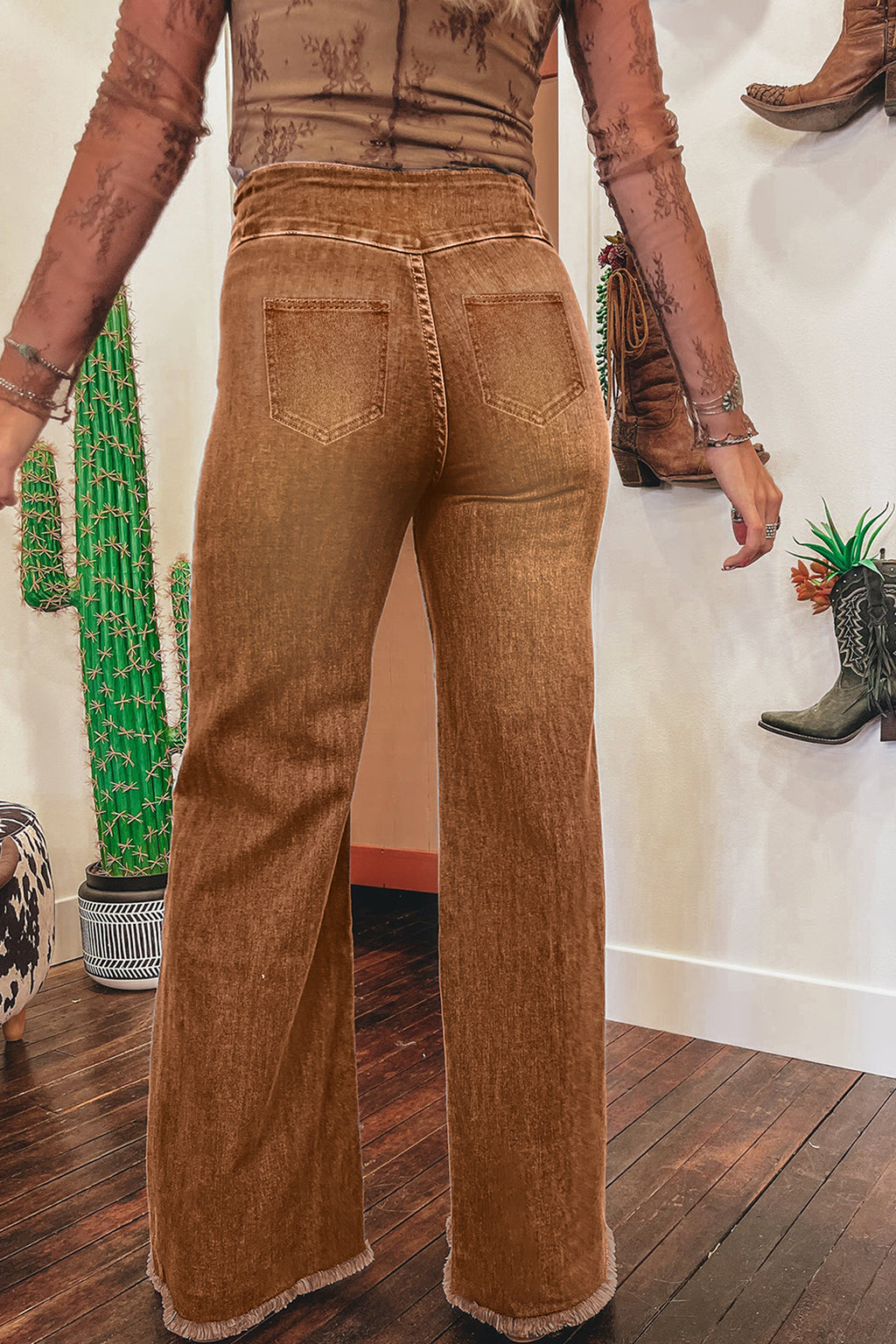Model wearing Women's Vintage Copper High-Waist Jeans back view