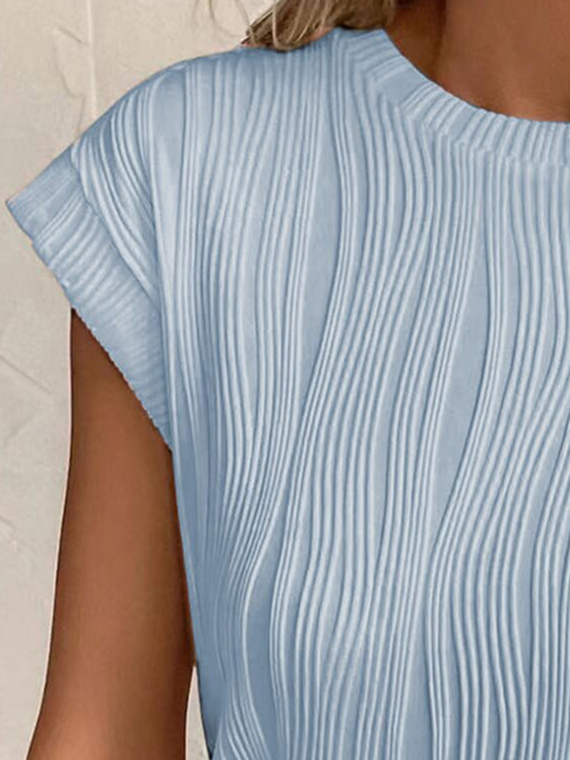 Close-up of textured fabric on Women's Misty Blue Round Neck Cap Sleeve T-Shirt