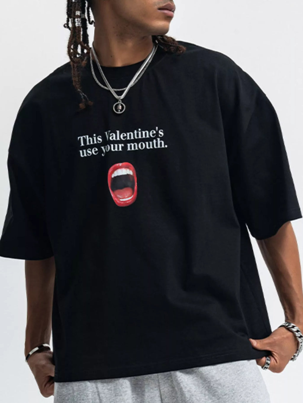 Male model wearing a black Unisex Valentine's Graphic Half Sleeve T-Shirt