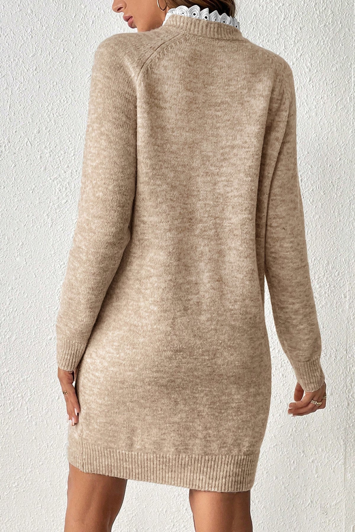  A Beige Cross Shoulder Mini Sweater Dress worn by a model, back view
