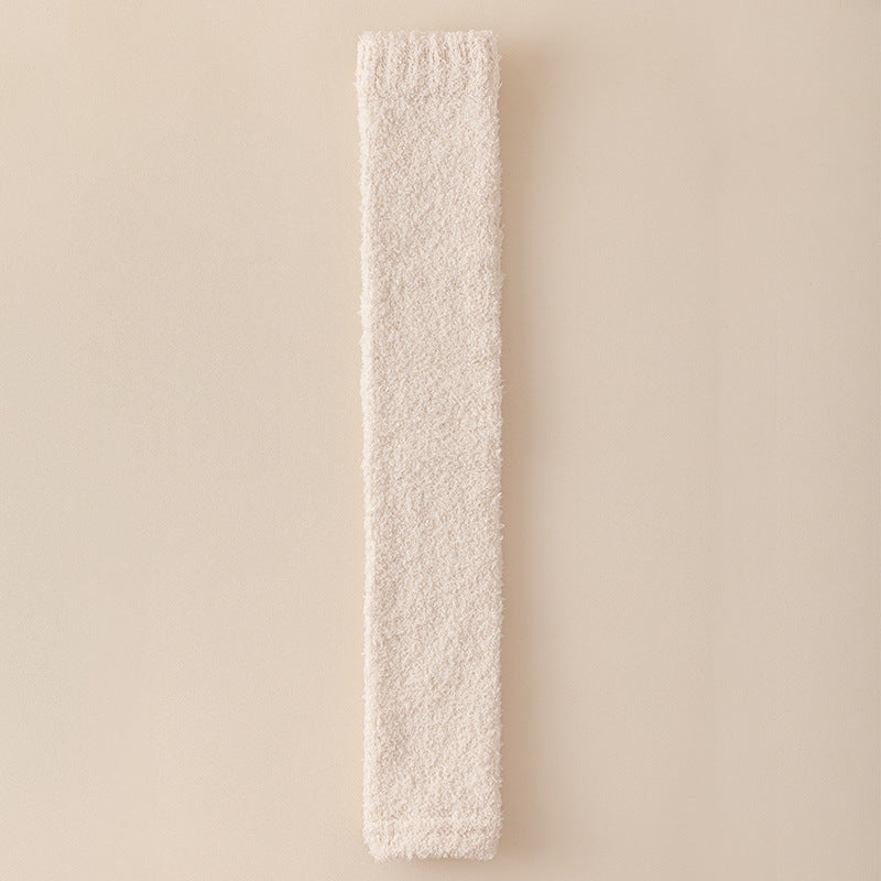 Rectangular white bar with textured surface on a beige background
