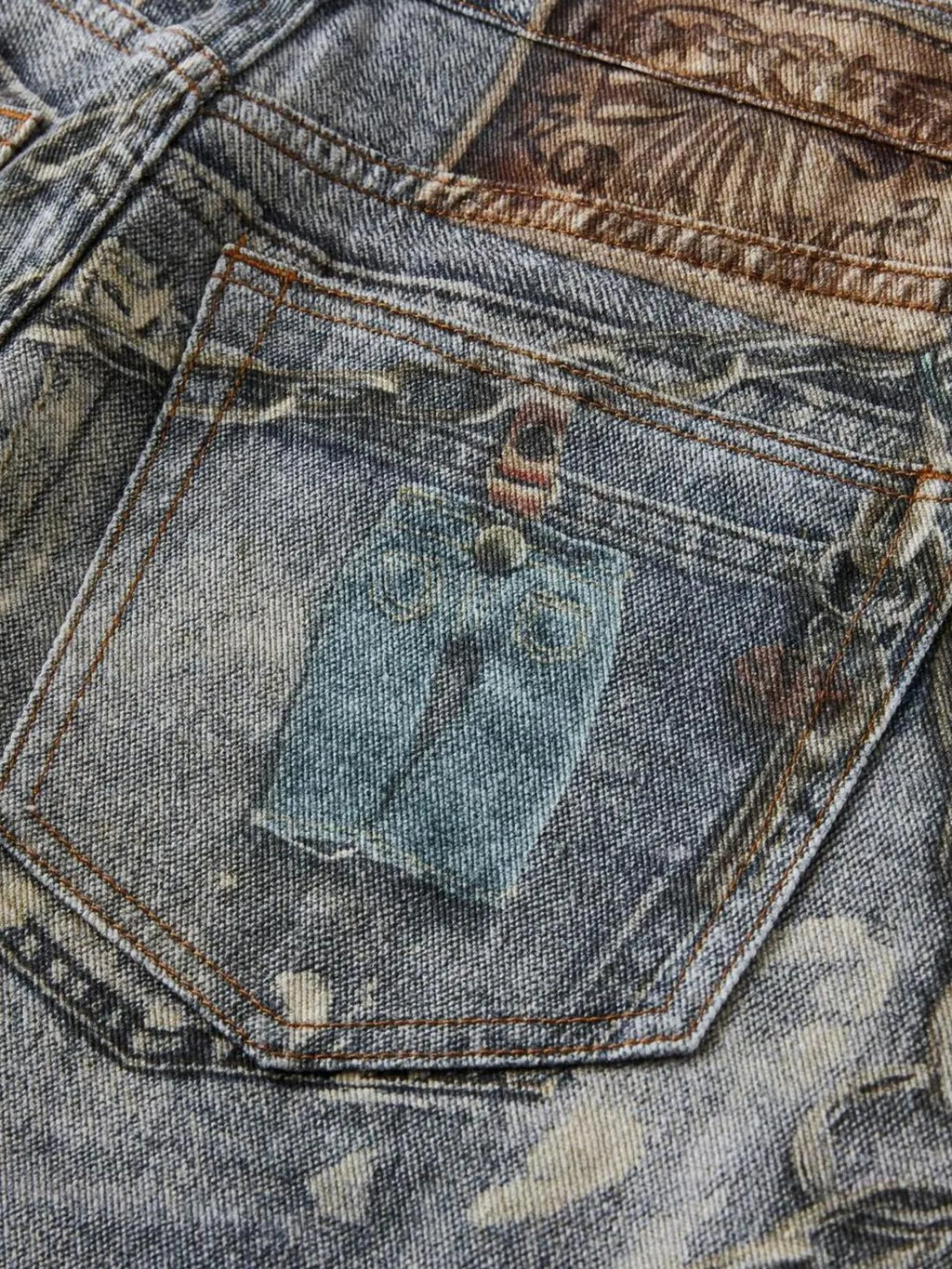  a pair of Modern Men's Distressed Printed Wide Leg Jeans back pocket close up