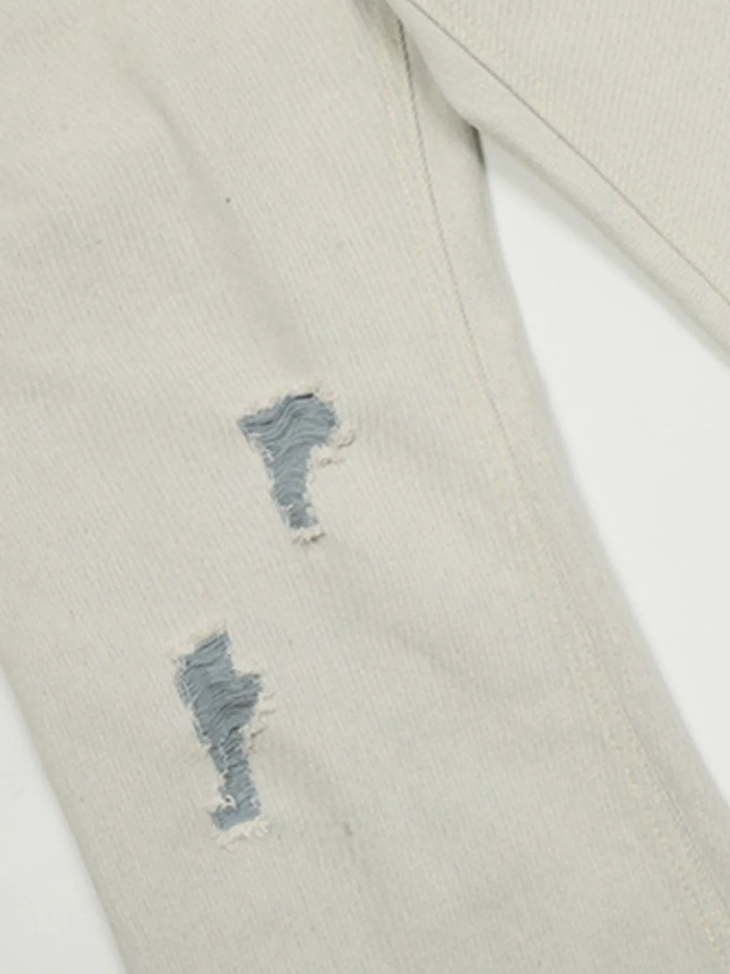 Men's White Distressed Wash Straight Leg Jeans distressed pant leg view