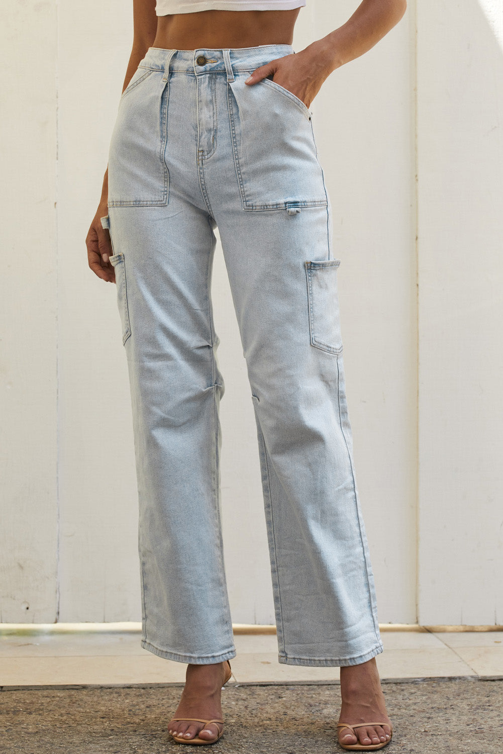 Women's Y2K Multi-Pocket Jeans worn by a model.