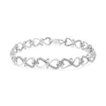 .925 Sterling Silver 1/3 Cttw Round-Cut Diamond Double Heart Infinity Link 7.25in Bracelet (H-I Color, I3 Clarity)