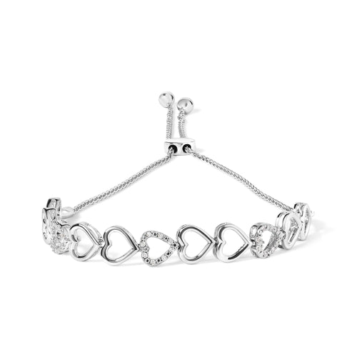 Silver bracelet with heart-shaped links on a white background
