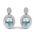 Elevate Your Style with Rhodium-Plated Sterling Silver Blue Topaz Earrings