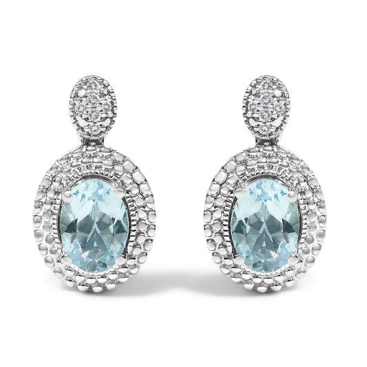 Elevate Your Style with Rhodium-Plated Sterling Silver Blue Topaz Earrings