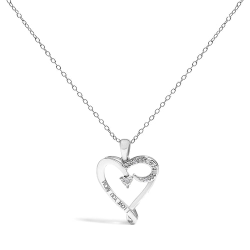 Heart-shaped silver pendant with 'MOM' engraving on a chain against a white background