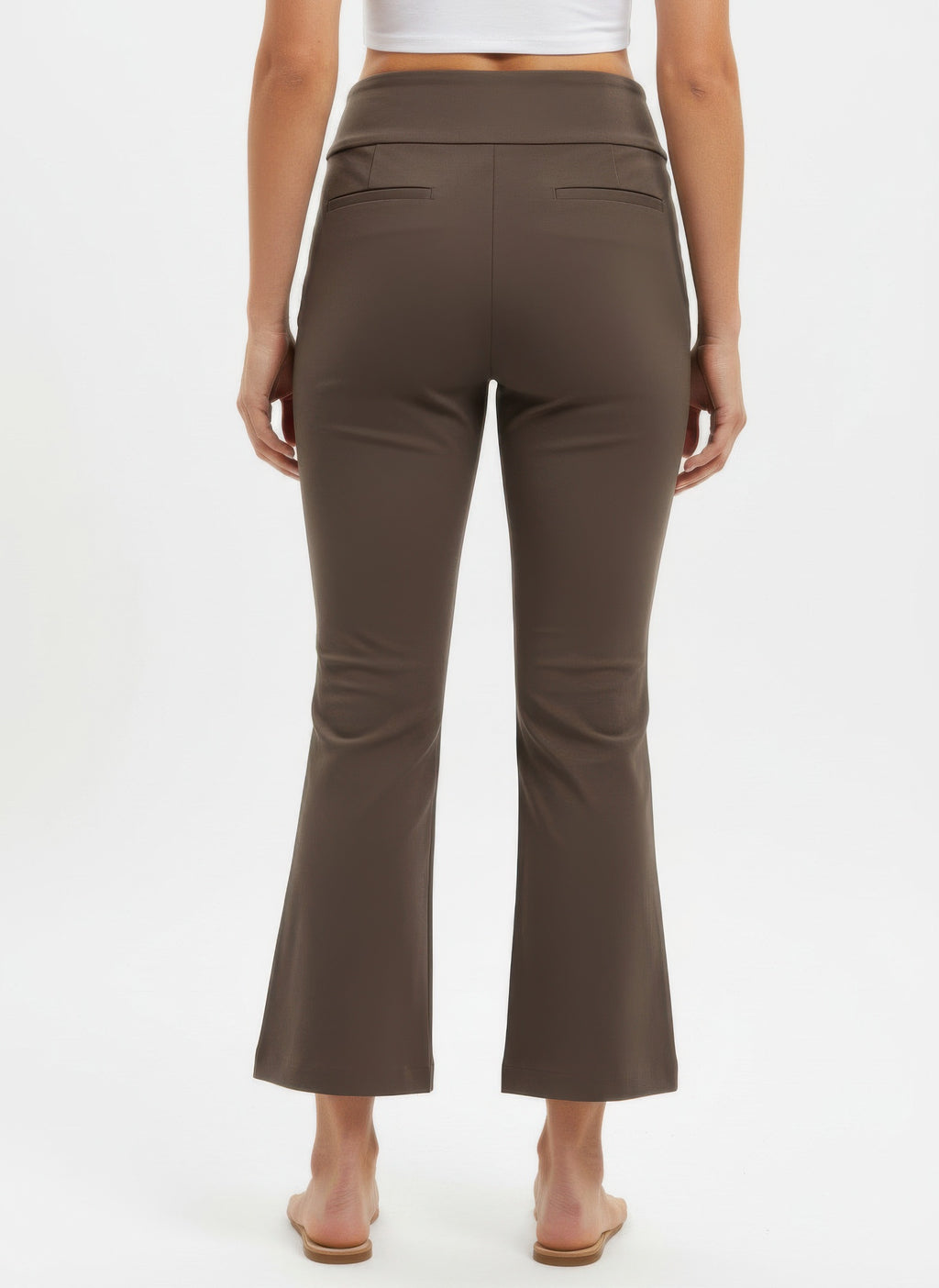 Brown pants worn by a person on a white background back view