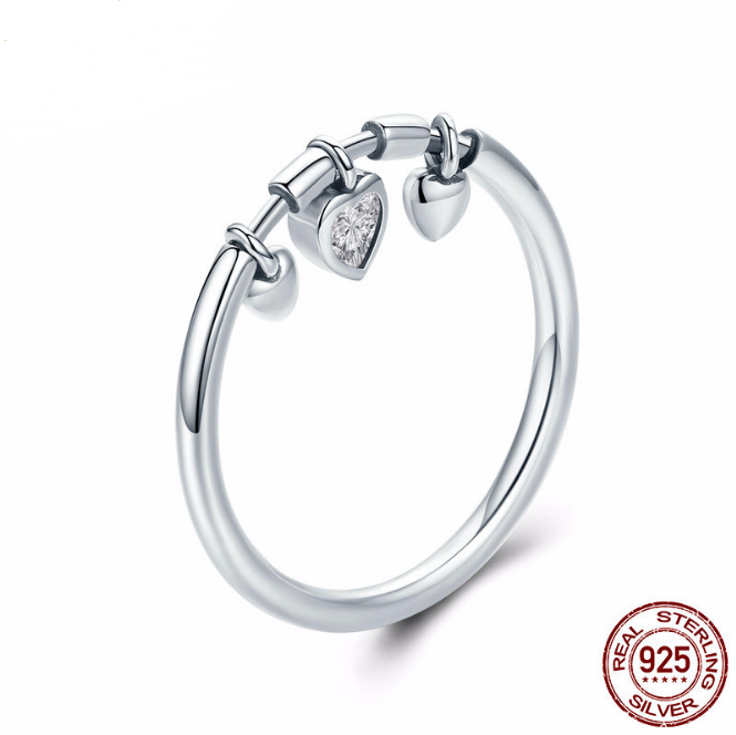 Experience pure elegance with our .925 sterling silver Heart Pendant Ring. This stunning piece is crafted with the highest quality silver, making it durable for everyday wear. Let the intricate heart design add a touch of dazzle to your outfit, perfect for any occasion