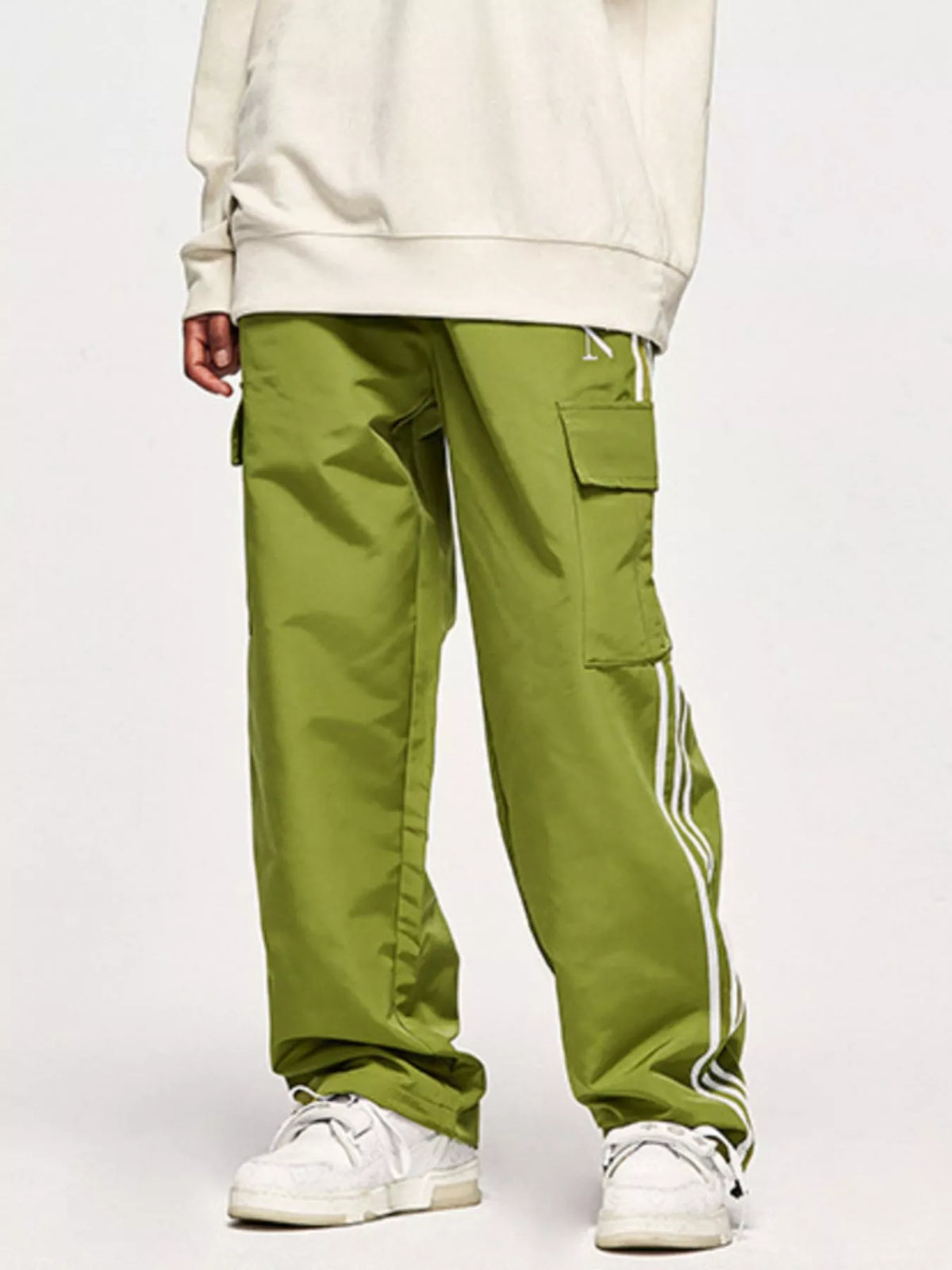 Model wearing avocado green Men's Side Striped Cargo Pants