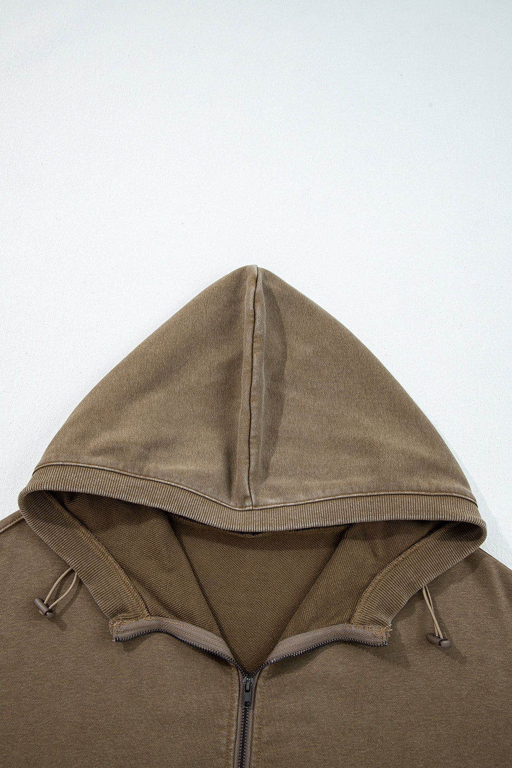 Brown hoodie with a zipper on a white background