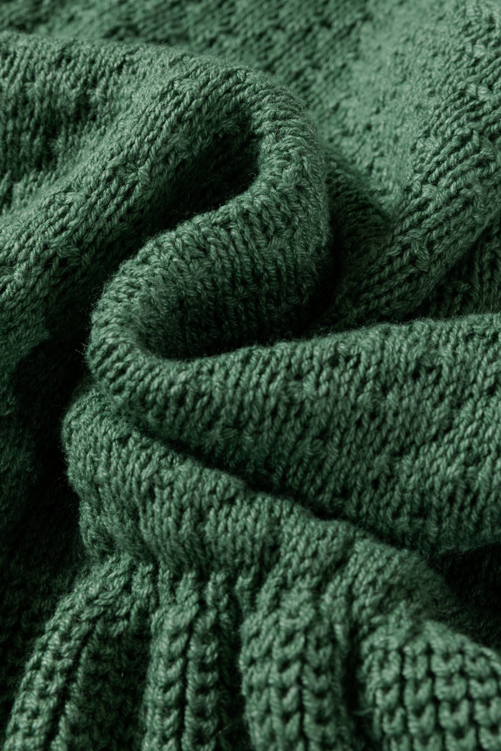 Close-up of a mist green Empire Waist Lantern Sleeve Sweater Dress with texture details