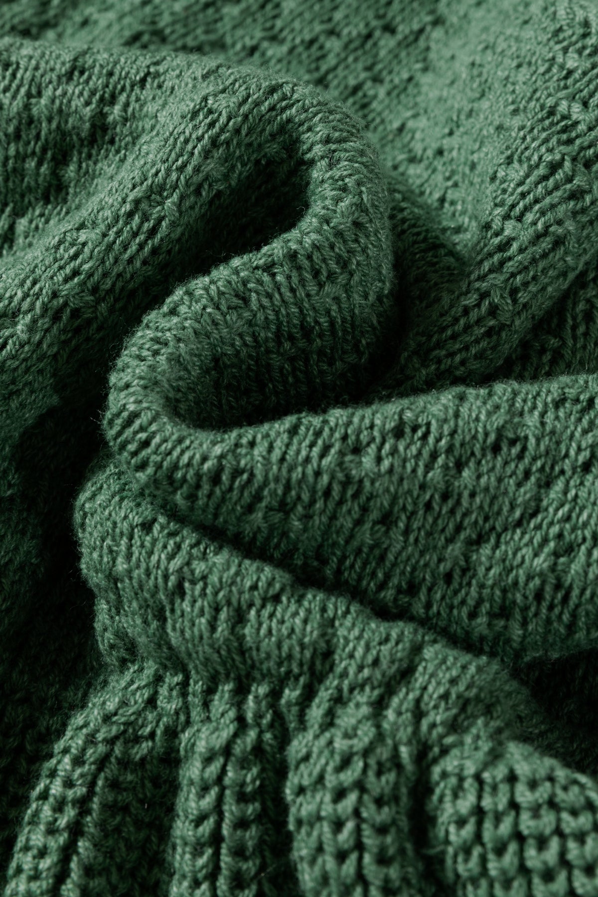 Close-up of a mist green Empire Waist Lantern Sleeve Sweater Dress with texture details