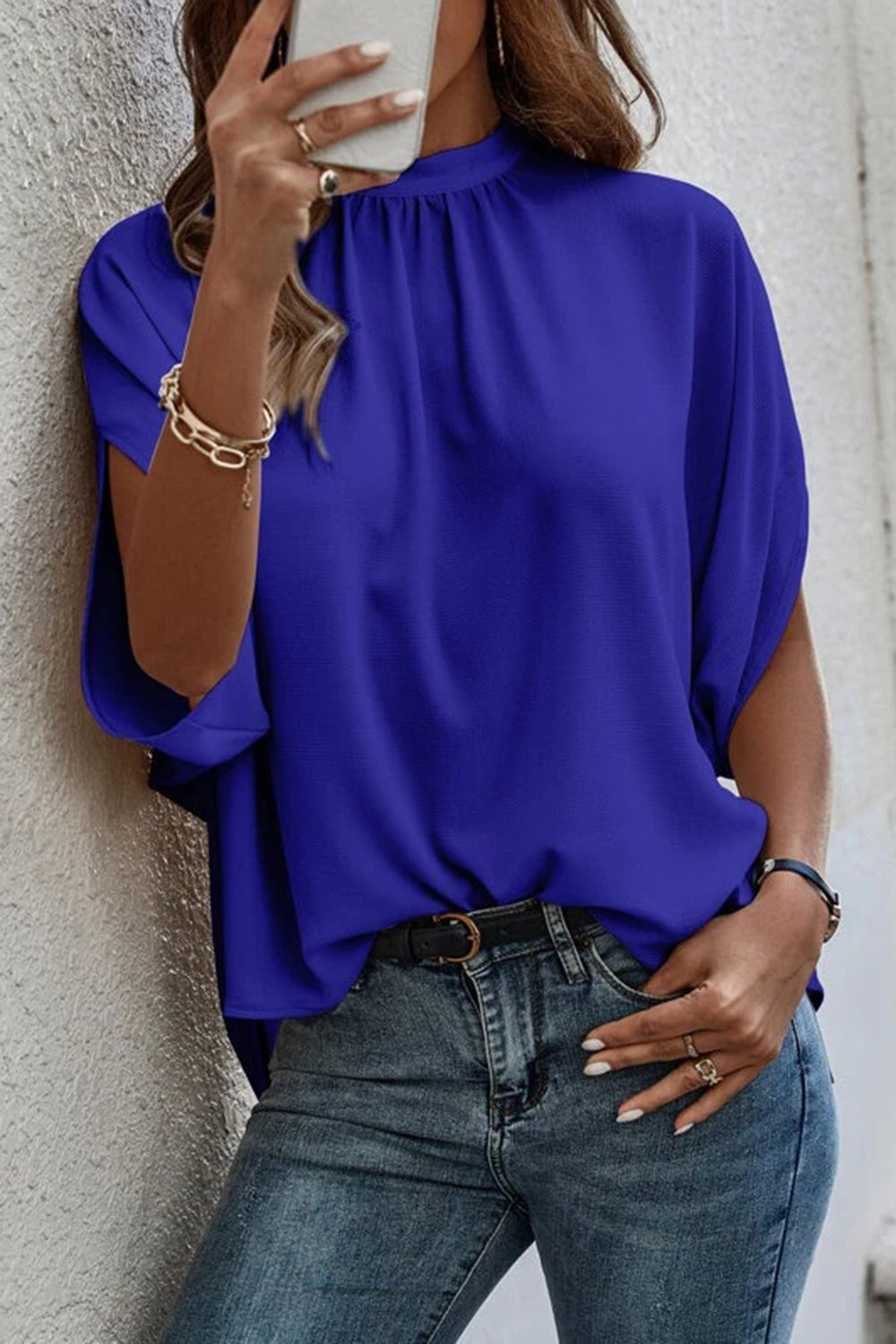 Model wearing an Exquisite Women's Royale Blue Tie Back Slit Half Sleeve Blouse