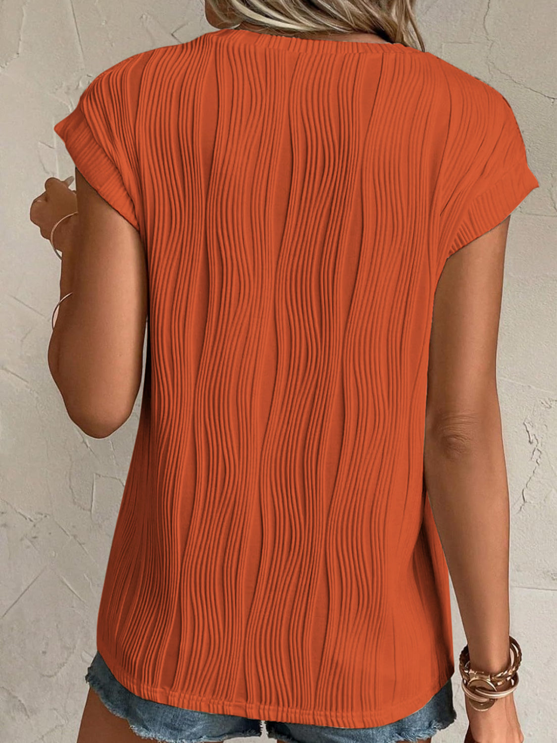 Back view of Women's Red Orange Textured Round Neck Cap Sleeve T-Shirt