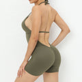 Person wearing a green bikini set on a white background
