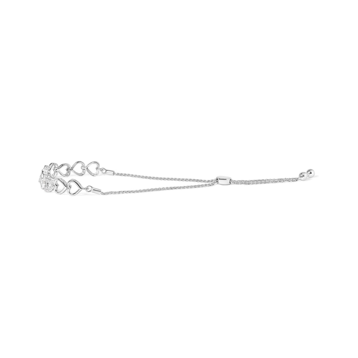 Silver bracelet with heart charm on a white background