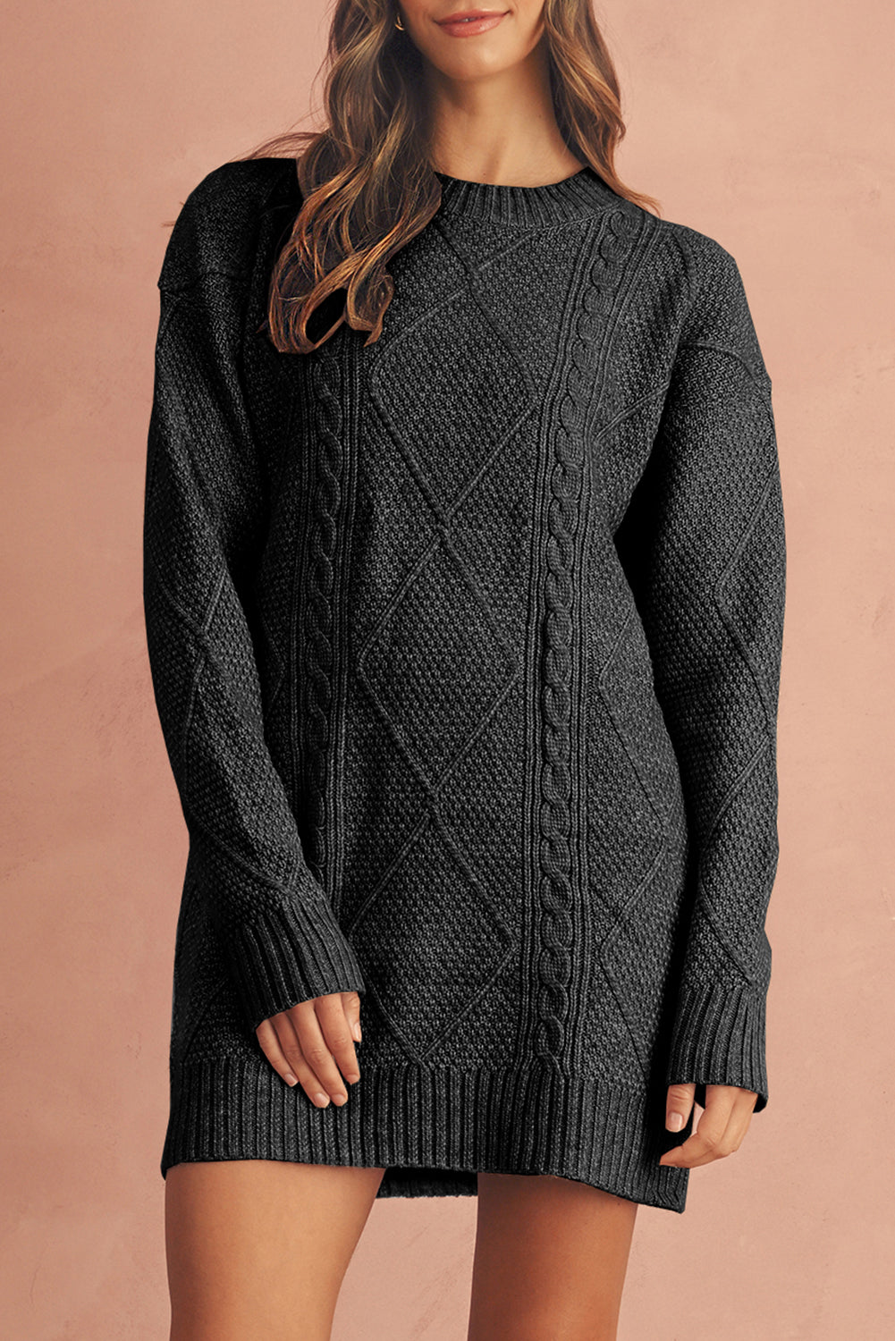 Person wearing a dark gray cable knit sweater dress 