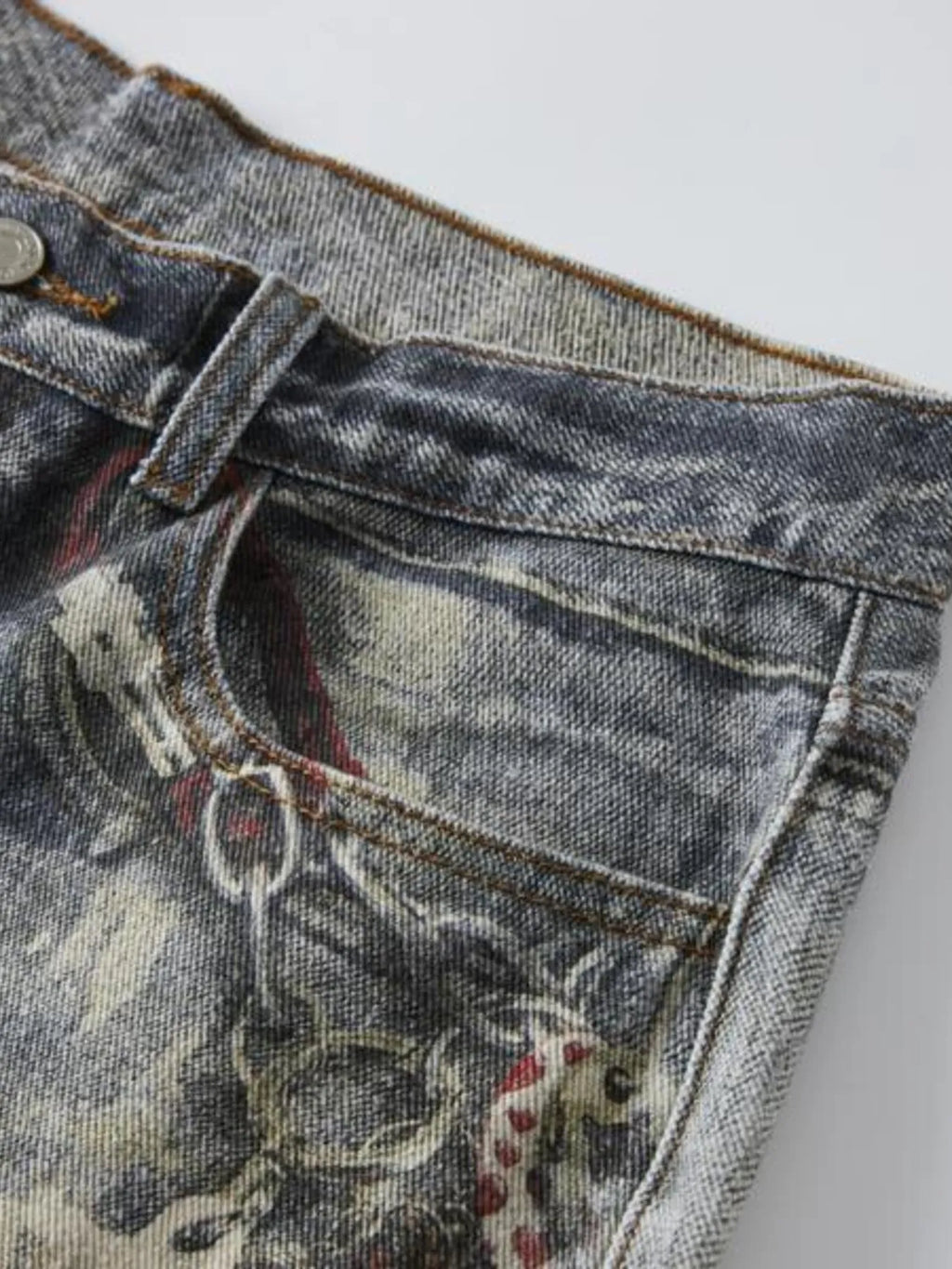 a pair of Modern Men's Distressed Printed Wide Leg Jeans front pocket printed detail view