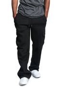 Male model wearing a pair of black casual draw string cargo joggers pants 