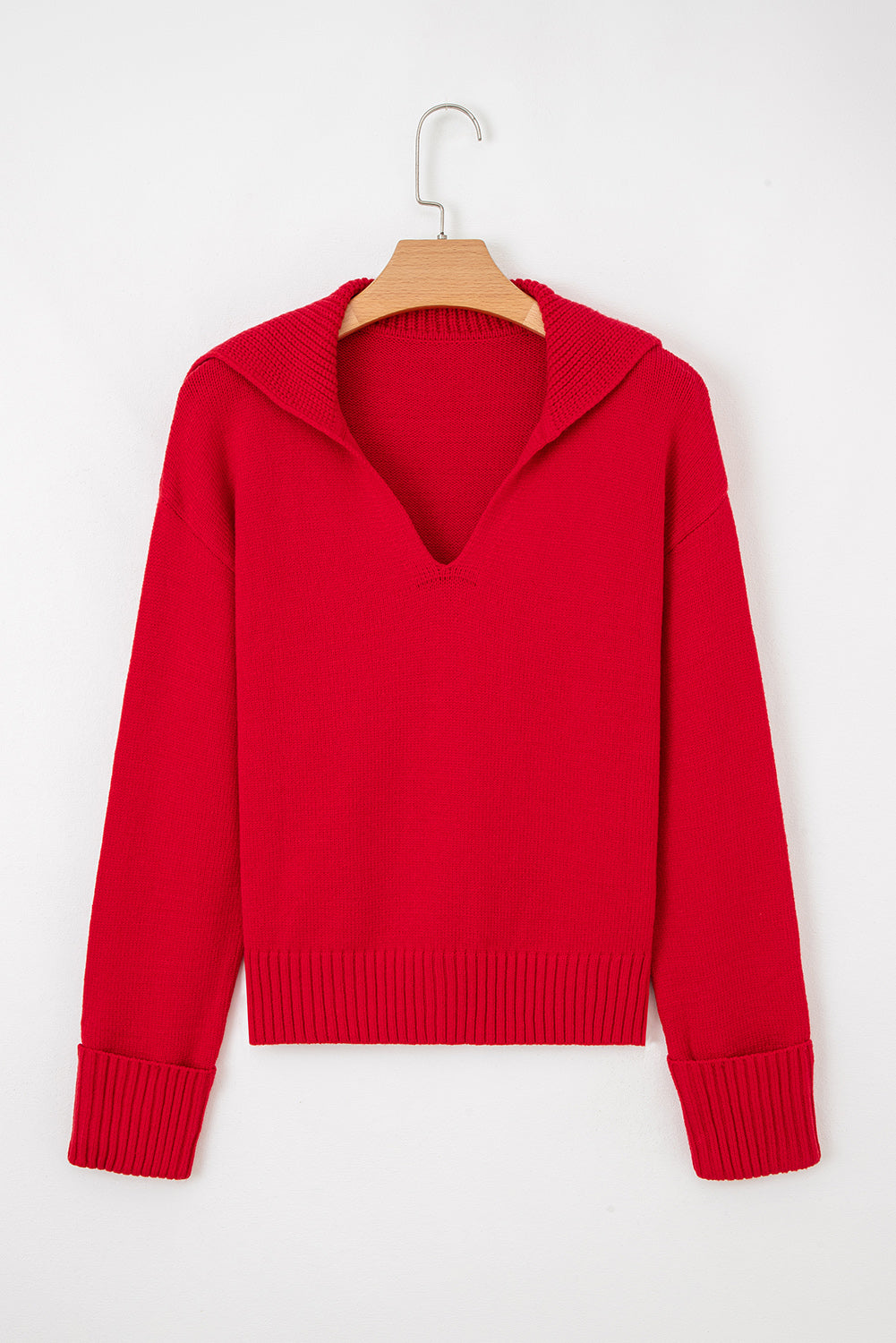 Racing Red Ribbed V-Neck Sweater on a wooden hanger front view 