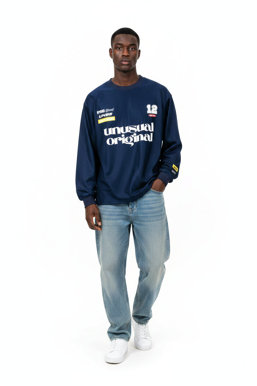 Male model wearing an "Unusual Original" Graphic Sweatshirt navy blue